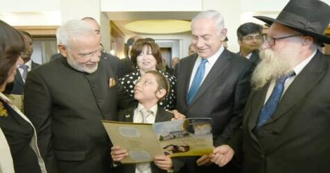 in isreal modi meet a small boy affected by mumbai bomb blast