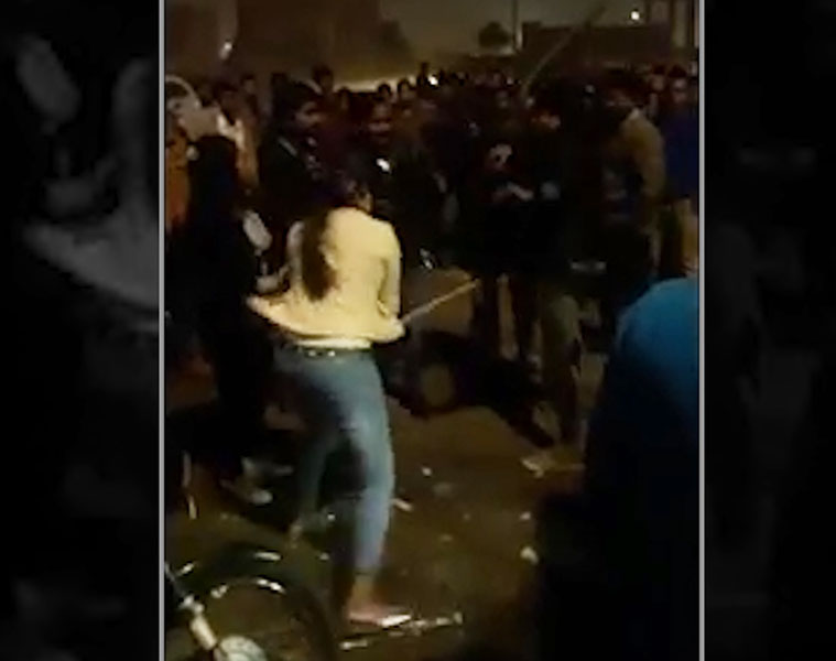 Girl thrashes eve teasers with stick