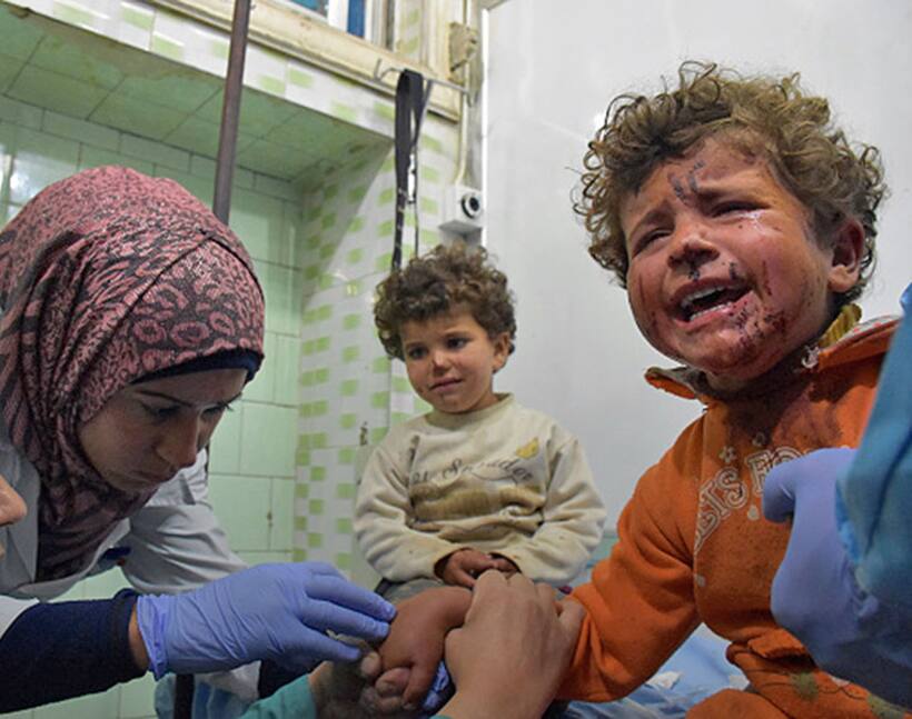 Watch: In Syria, even photographers are now rescuing injured children