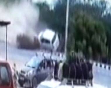 Watch: Speeding car hits divider, overturns multiple times
