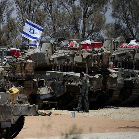 Israeli strike kills 14 in Gaza as military expands ground offensive