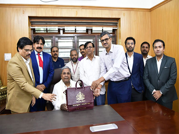 Karnataka CM Siddaramaiah with Budget document (Photo/ANI) Karnataka CM Siddaramaiah with Budget document (Photo/ANI)