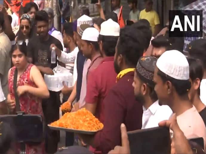Muslim youths join Ram Navami celebrations in West Bengal's Siliguri, distribute water bottles, shower flowers