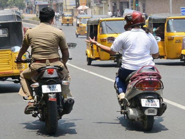 Traffic police govt officials pay double fine if they violate traffic rule