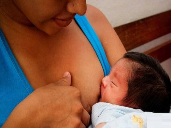 A transgender woman breastfeeds for the first time