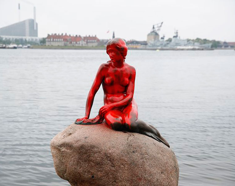 Little Mermaid statue in Denmark painted red in whale hunting protest