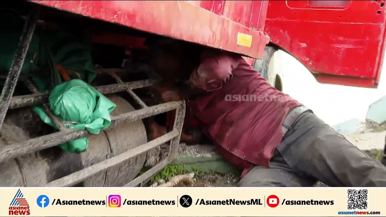 തേവരപാലത്തില്‍ അപകടത്തില്‍പ്പെട്ട ലോറി ഉയര്‍ത്താനുള്ള ശ്രമം തുടരുന്നു | Accident news | Ernakulam