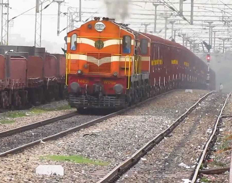 viral video : woman Calmly Talks On Phone As Train Passes Over Her