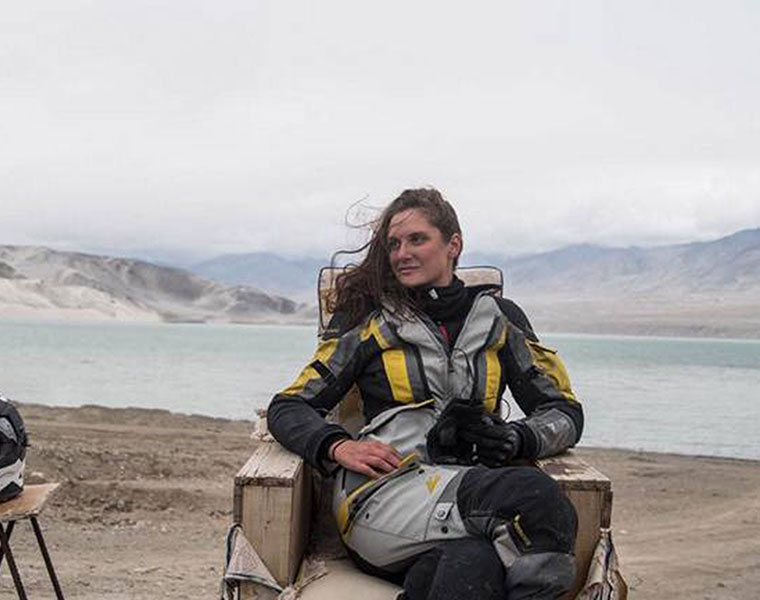 this women trawelling on a bike and passing 37 countries